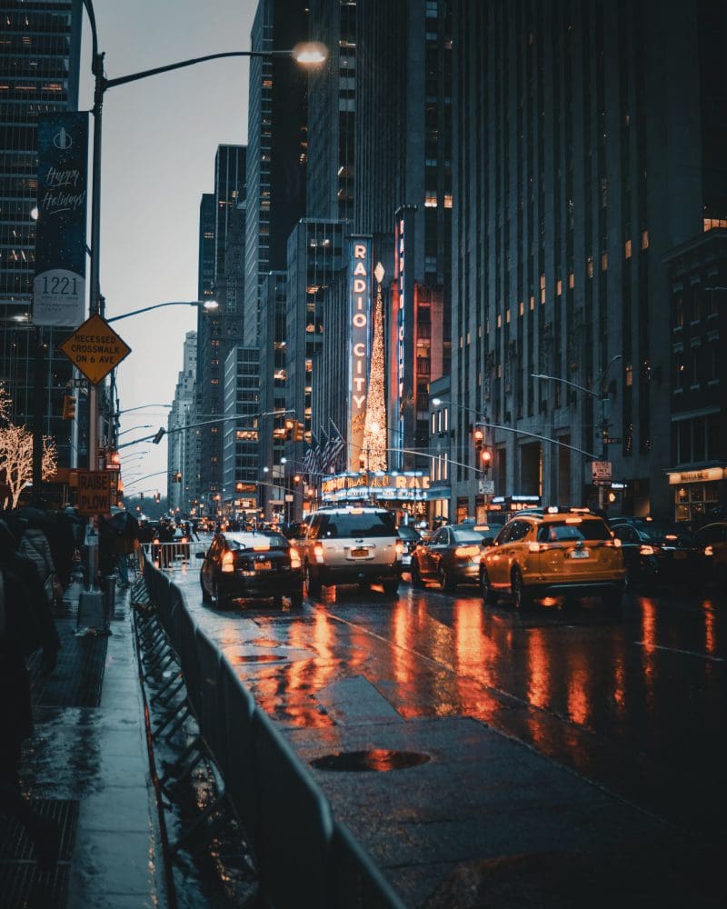 A city street filled with lots of traffic.